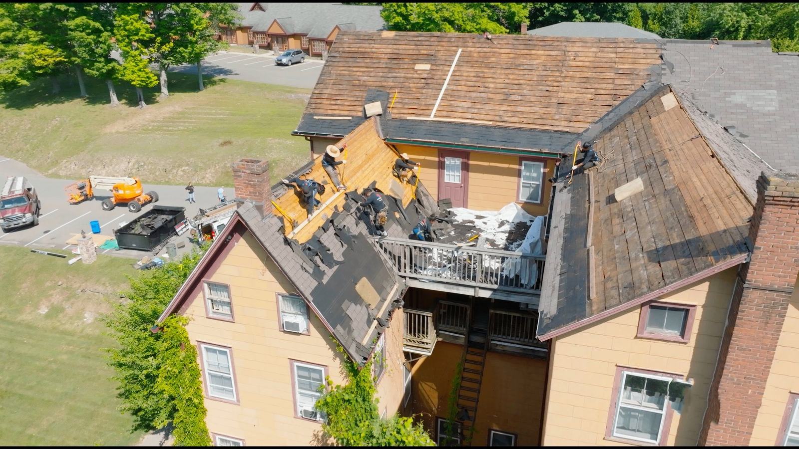 Full roof replacement — historic inn before